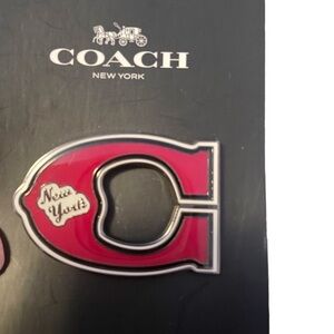 Coach Varsity enamel pin